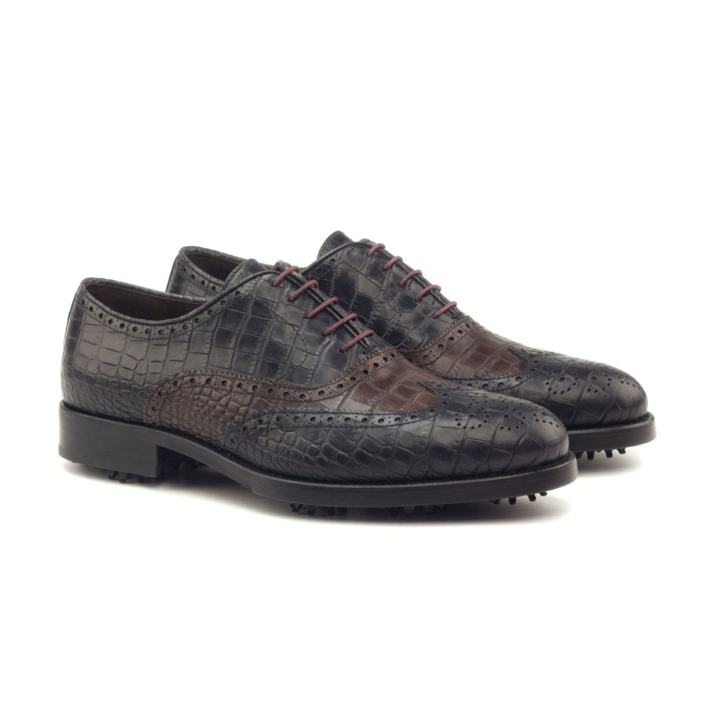 The Brogue Golf Shoe: Mixed Croc. Black painted crocodile, dark brown painted crocodile golf shoes with toe embellishments on a white background