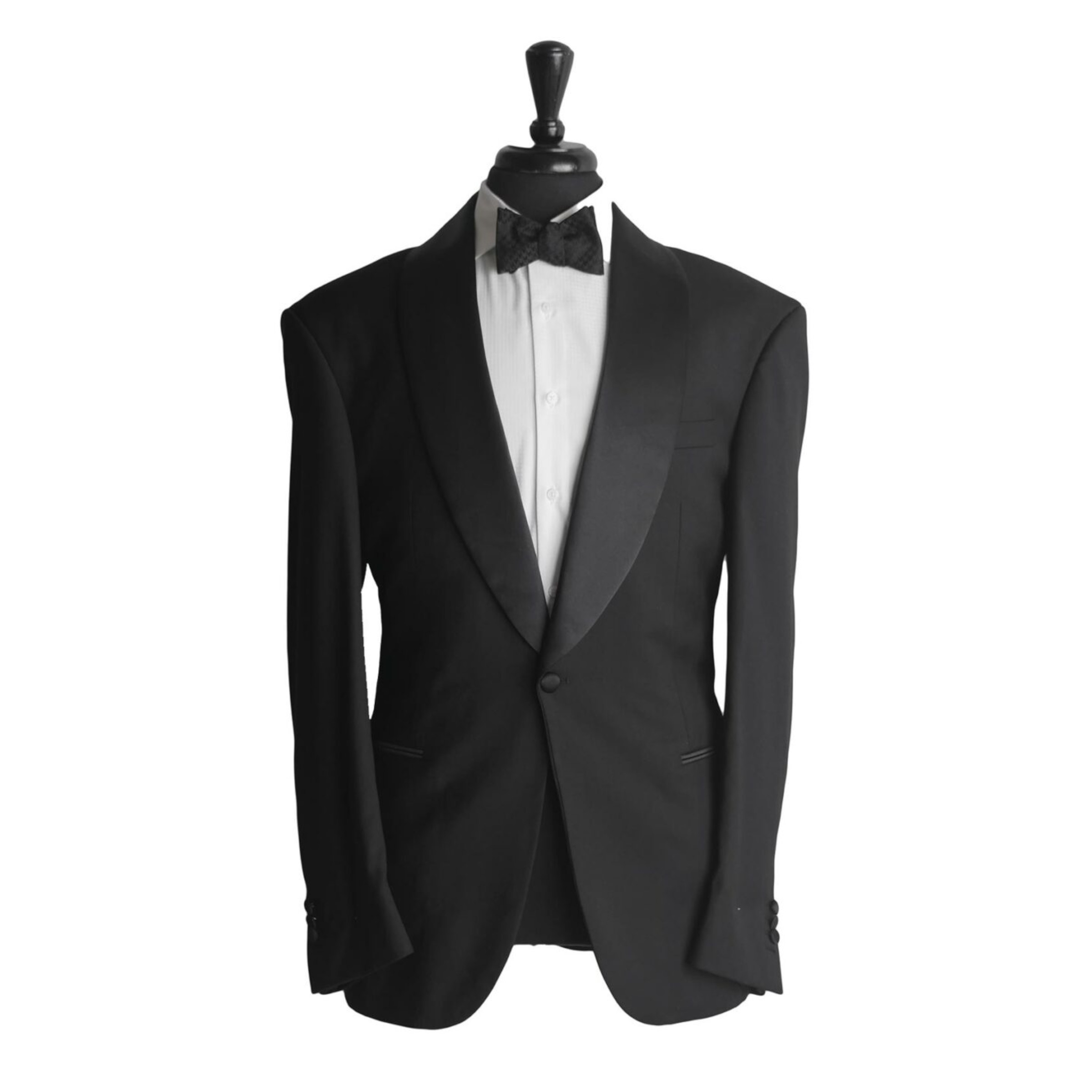 A black tuxedo jacket on a body form with a bkack bowtie and white shirt on a white background
