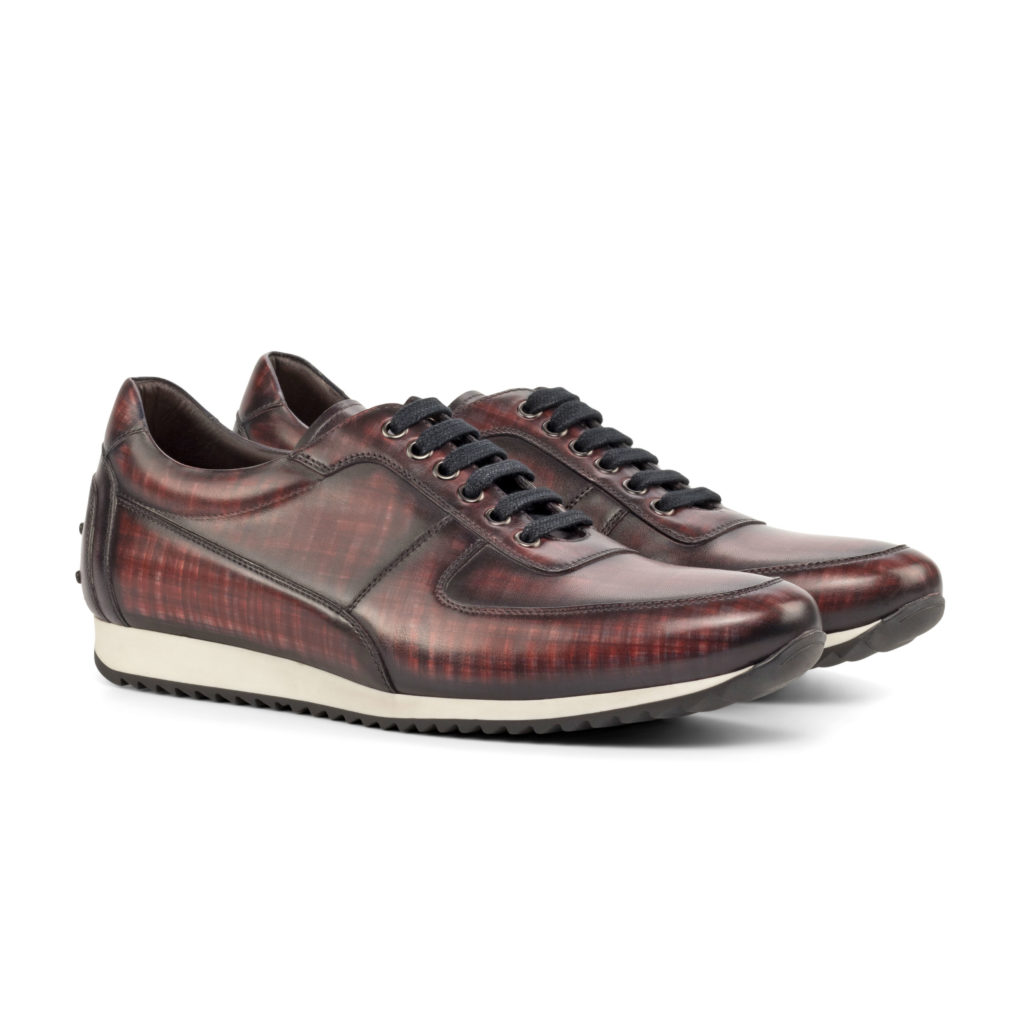 The Ferruccio: Aubergine Patina. burgundy and aubergine patina leather vintage style lace up sneakers on a white background
