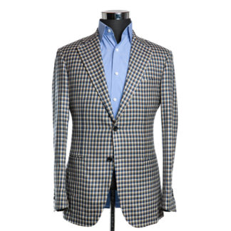 A blue and white check print sport coat on a body form with a sky blue shirt on a white background