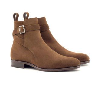 The Stallion: Stallion. Medium brown luxury suede riding style ankle boots with strap and buckle on a white background