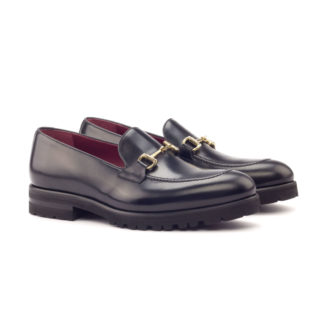 The Richmond: Onyx. Black painted croco loafers with metal buckles against white background