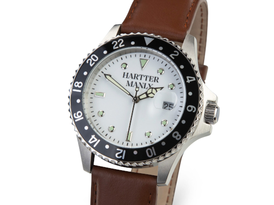 HARTTER MANLY branded watch with white face, black border, and brown leather strap.