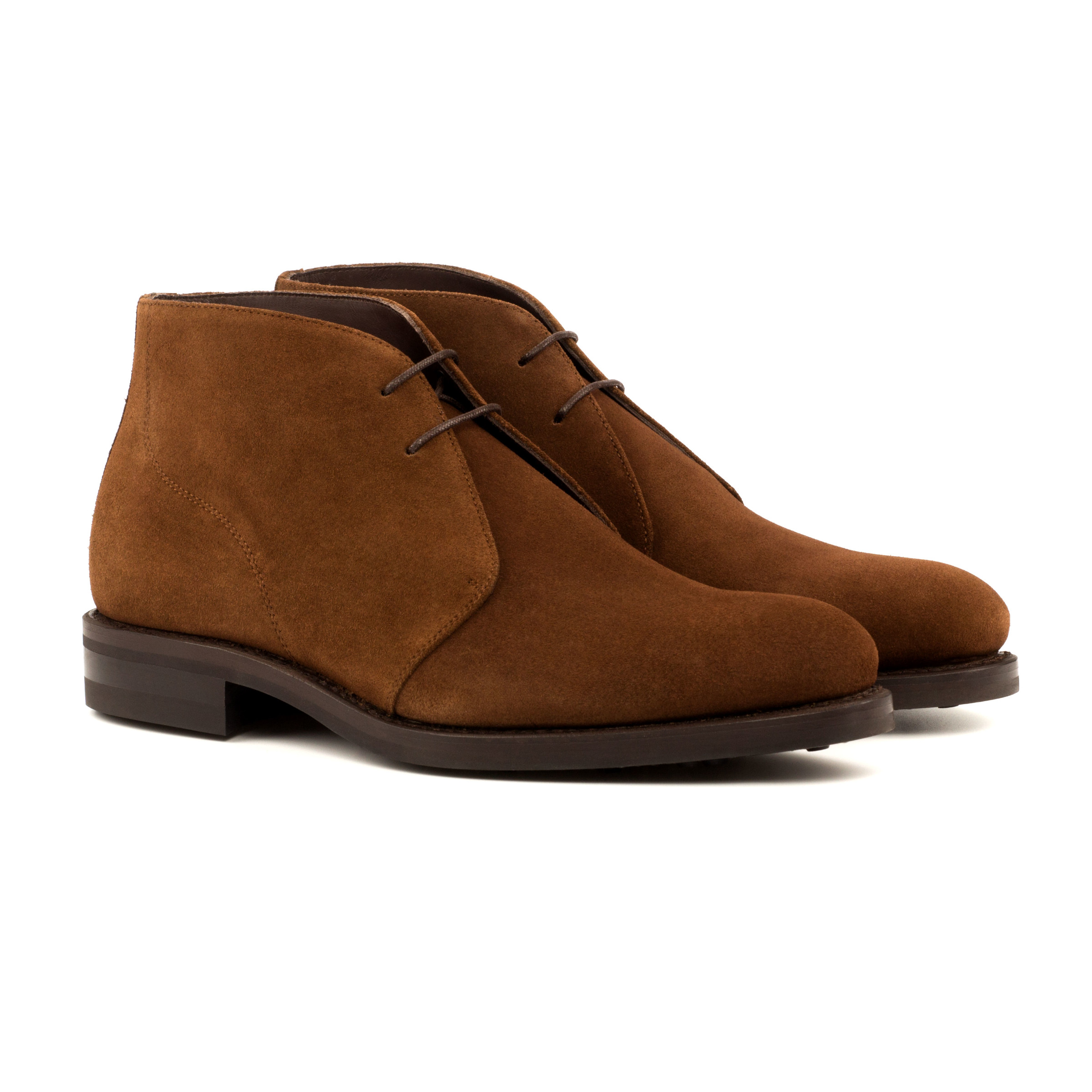 The Arborist: Brown Suede. Front side facing view of med brown lux suede ankle style leather boots with laces on a white background