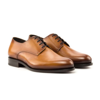 The Latus: Cognac. Front side view of cognac box calf leather men's style lace up dress shoes on a white background