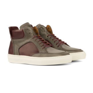 Front side view of high top: burgundy/grey featuring pained calf, grey painted calf leather high top style sneakers with white soles on a white background
