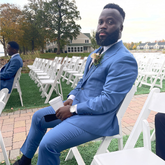 man in suit at wedding